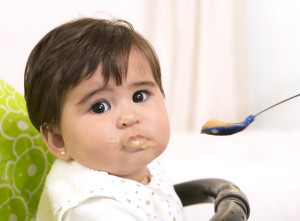 Feeding a cute Lovely Baby Girl