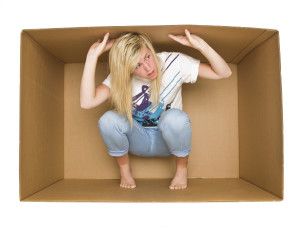 Woman inside a Cradboard Box